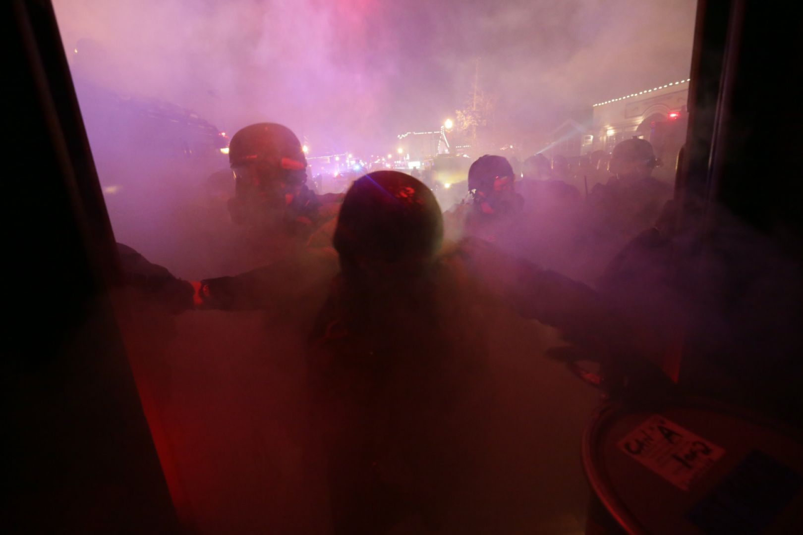 St. Louis County Police respond to crowds after grand jury announcement
